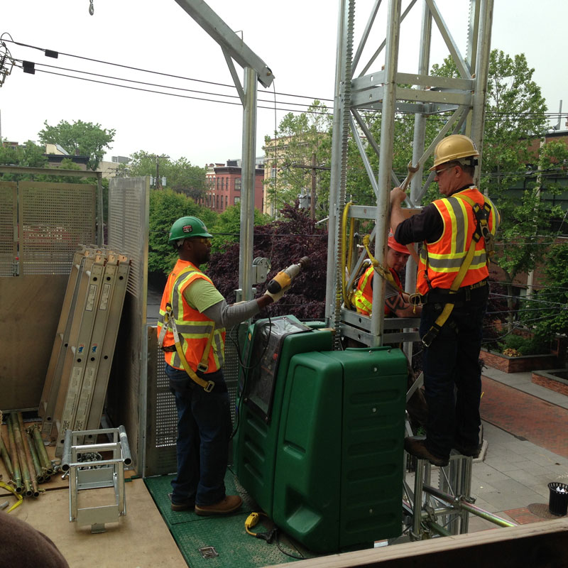 two men installing the thing