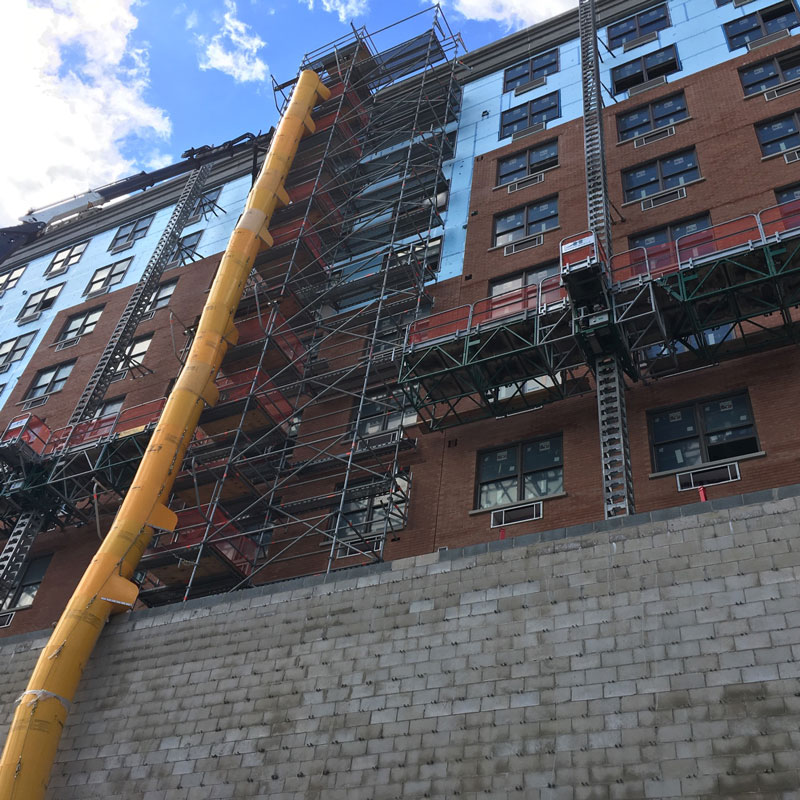 scaffolding on building with chute